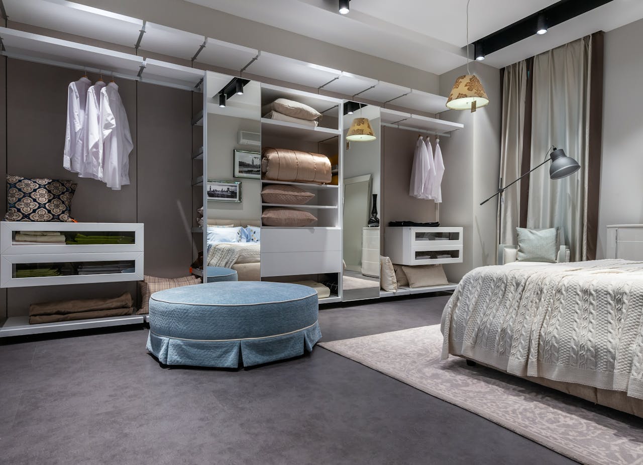 why-choose-us Interior of design of modern bedroom with comfortable bed carpet and built in wardrobe